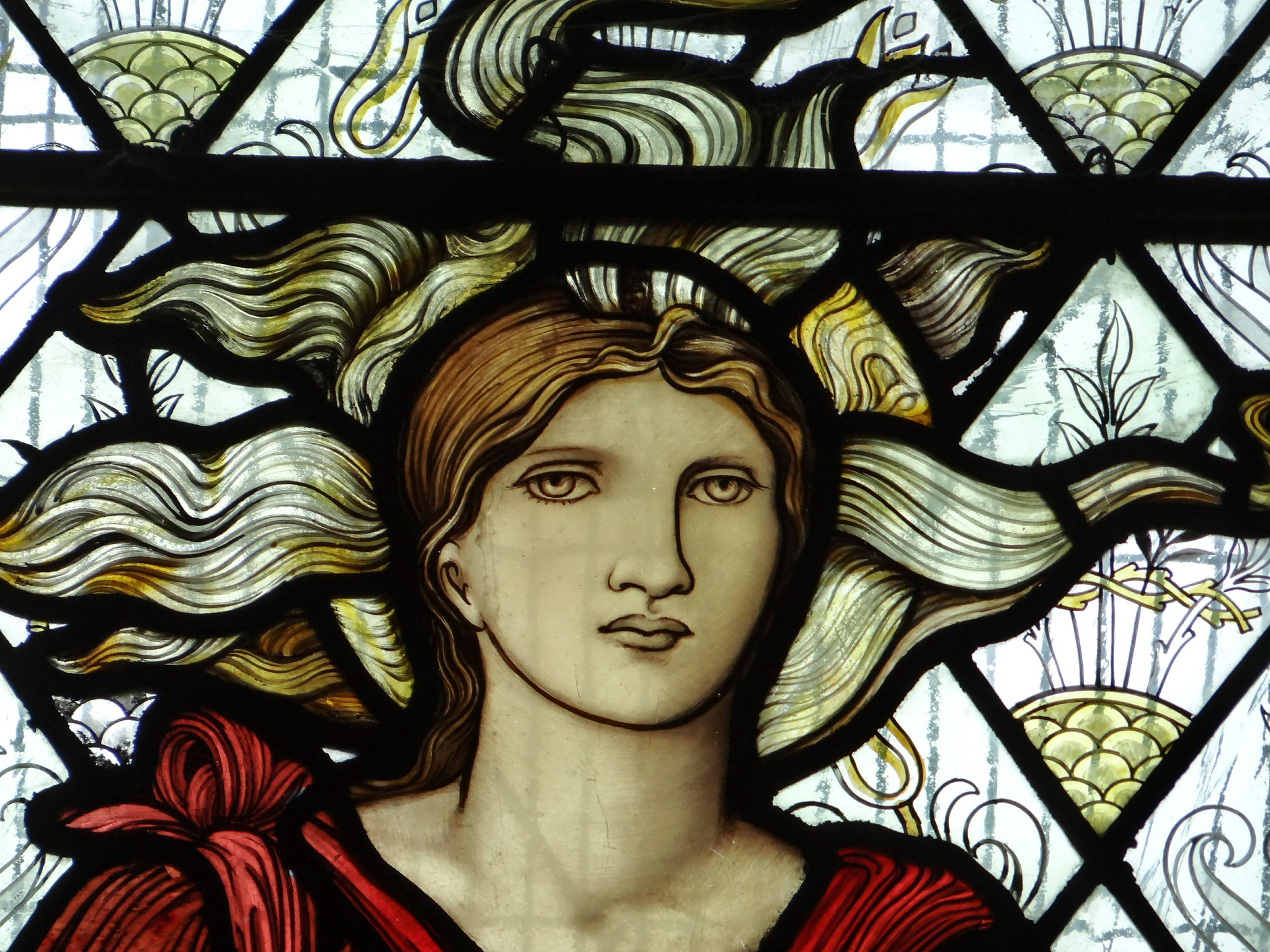 Caritas in Red stained glass window by Edward Burne-Jones. Pic: Rex Harris