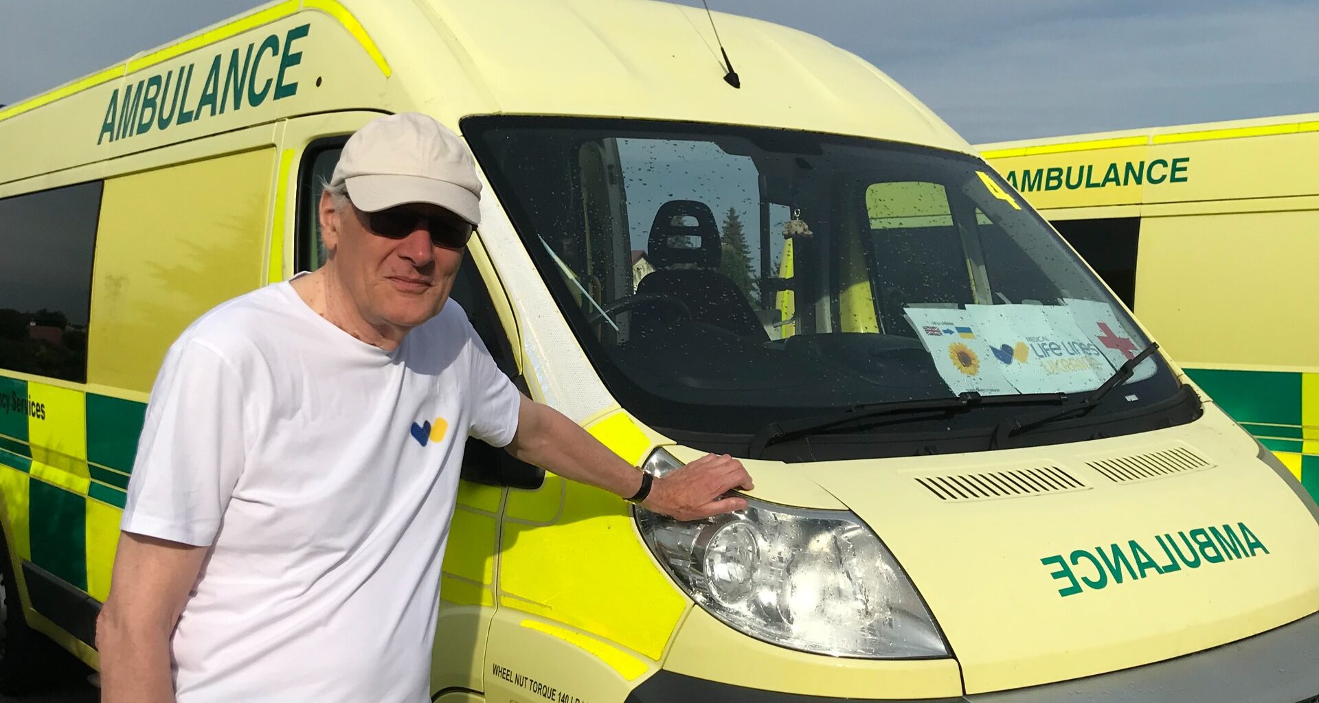 Jonathan Callaway in front of an ambulance heading to Ukraine