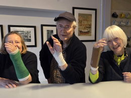 Yvonne Guerrier, Eileen St Julian-Bown, and Bruce St Julian-Bown show off their broken arms.