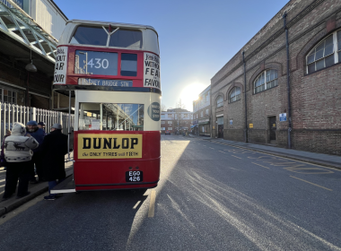 The 1930s STL bus at Putney Bridge Station on Christmas Day, complete with period Hovis advertisement