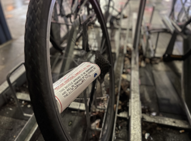 An abandoned bike tagged at the Disraeli bike racks