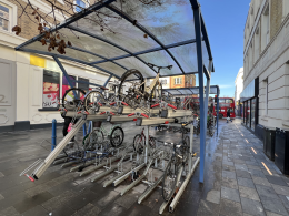 A bike rack on Disraeli road - with more abandoned bikes than usable ones.