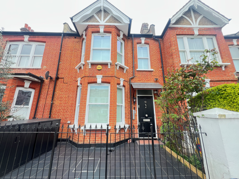 Number 10 Elsenham Street, Southfields, and the house next door, sharing a wall