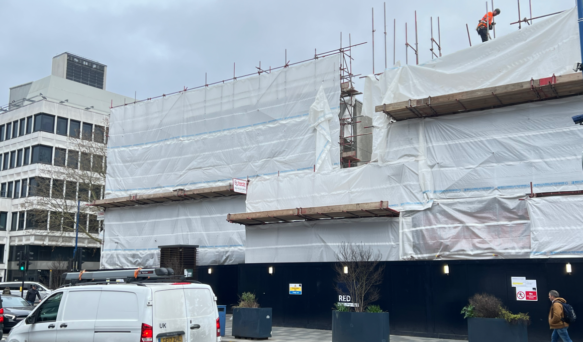 Work has restarted on the corner of Putney Bridge Road and the High Street