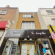 Squatters on Putney High Street with 1312 sign