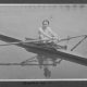 Black and white photograph of a 12-year-old Jack Beresford on the Thames in 1911, with his name written in his own handwriting beneath the image.