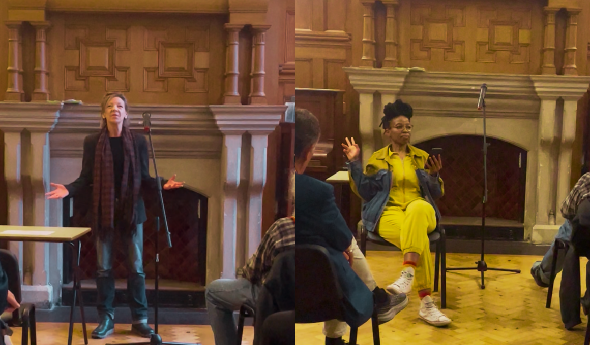 Panel discussion in a wood-paneled room; woman in a bright yellow suit gestures while another speaker stands at a microphone.