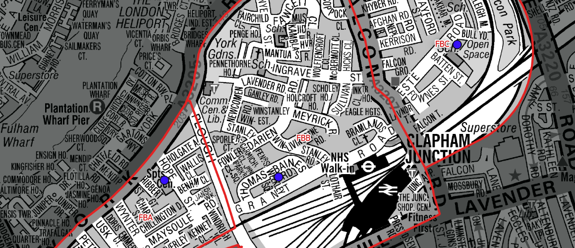 Close-up street map of Clapham Junction area with red boundary lines and blue markers, showing surrounding streets and rail lines for navigation.