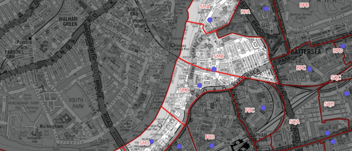 Grey city map with red district boundaries and blue markers indicating locations