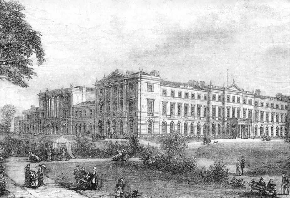 Historic engraving of a grand neoclassical mansion with colonnaded wings, set in a landscaped park with people strolling and carriages in the foreground.