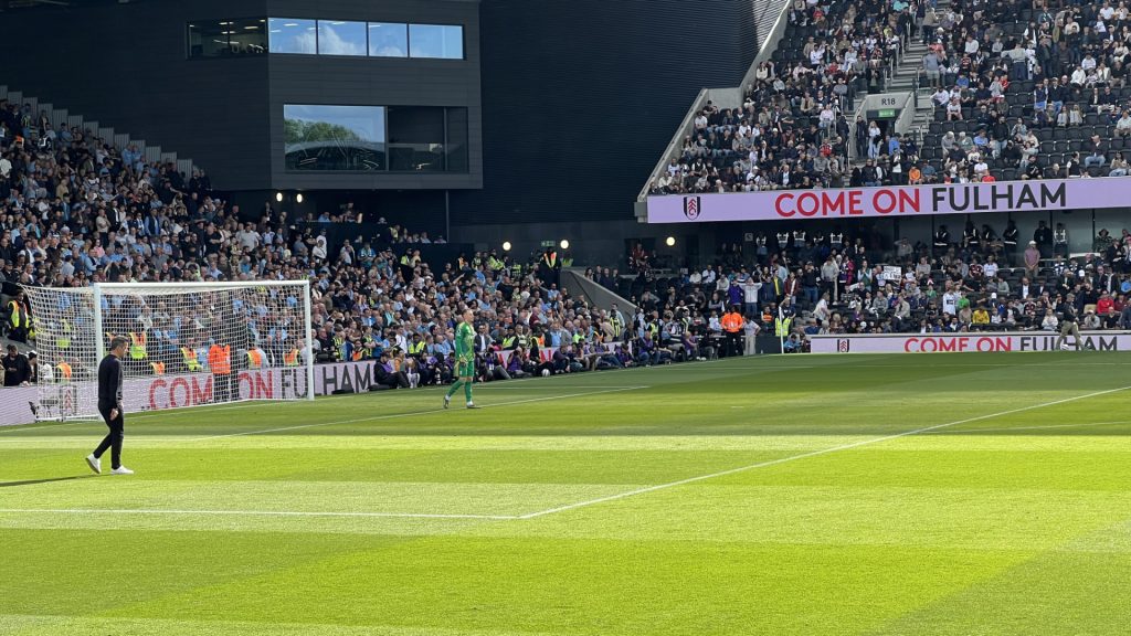 Marco SIlva walks onto the pitch at Fulham