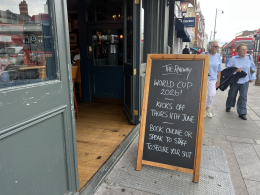 World Cup sign outside The Railway Pub on Putney High Street