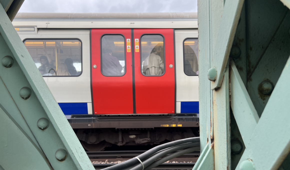 A District Line train crossing the Thames over Putney bridge