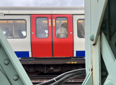 A District Line train crossing the Thames over Putney bridge