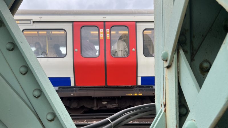 A District Line train crossing the Thames over Putney bridge