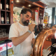 Amir Matinahmadi pulling pints behind the Park Tavern.