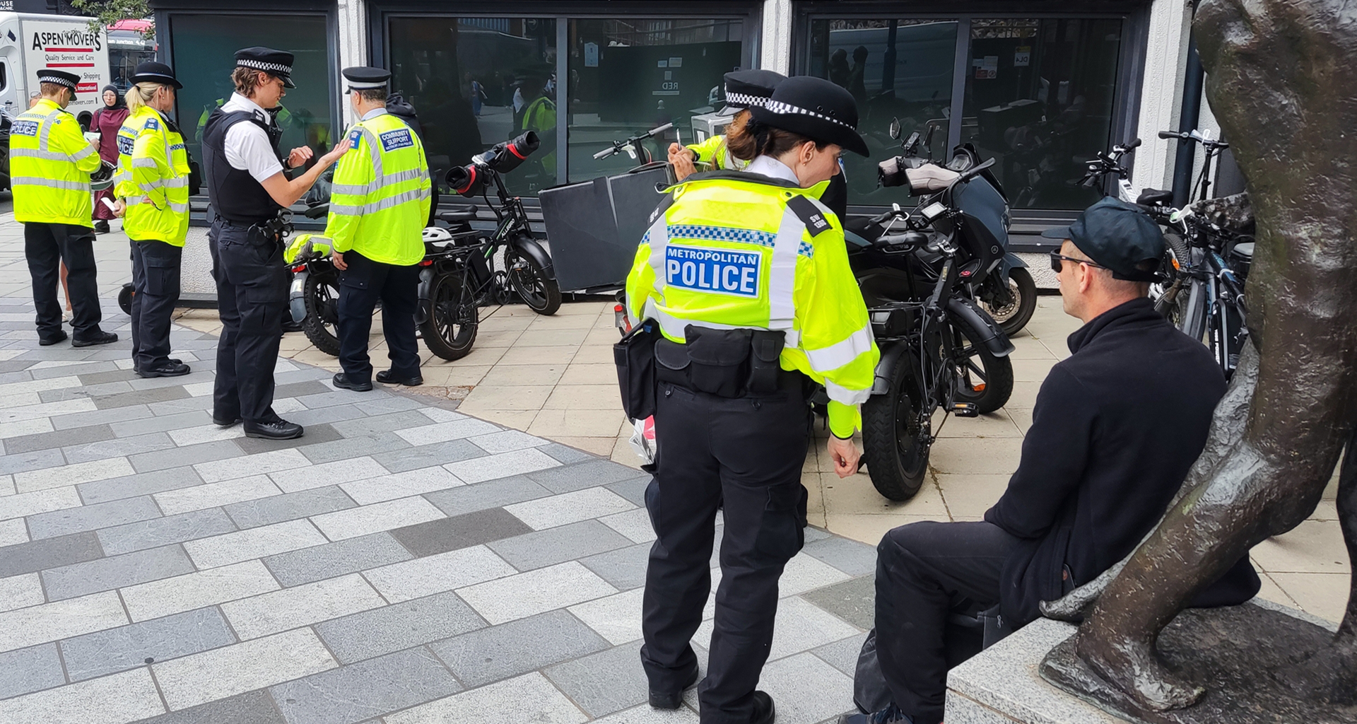 Putney officers speak to a man during the operation. Pic: Michael Madden