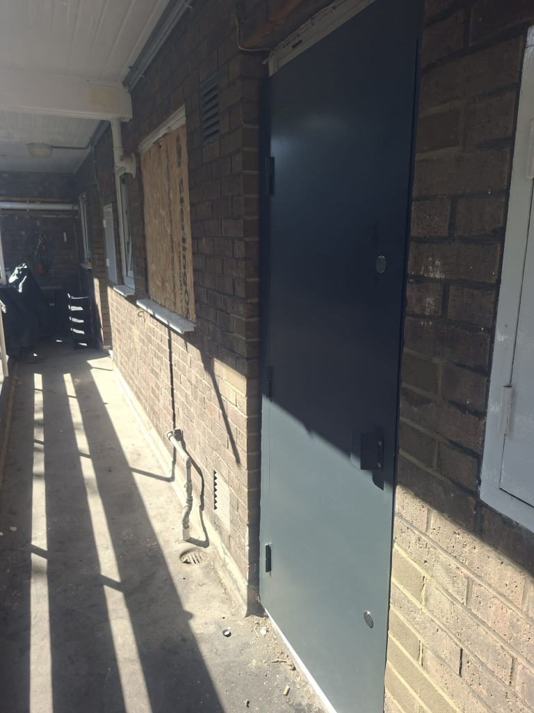 Boarded up flat on Fownes Street