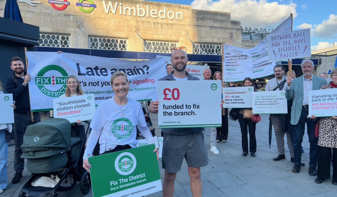 Fix the District protestors outside Wimbledon station, September 2026