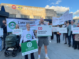 Fix the District protestors outside Wimbledon station, September 2026