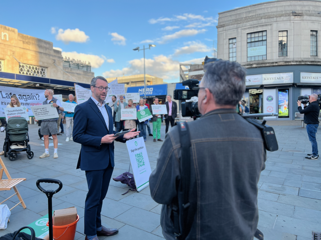 ITV News covering the Fix the District protest