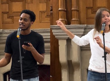 Adinoyi Okeji, left, and Nadia Larina, right, each performing at a microphone in the oak-panelled Putney Library Hall