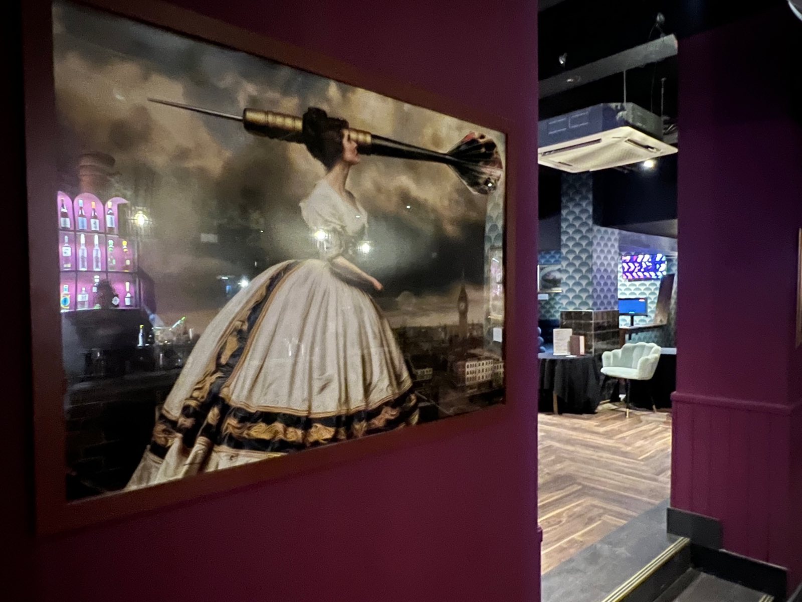 A painting of a Victorian lady with a giant dart through her head