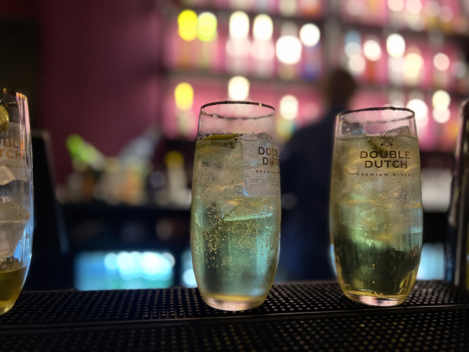 Two gin and tonics on the bar