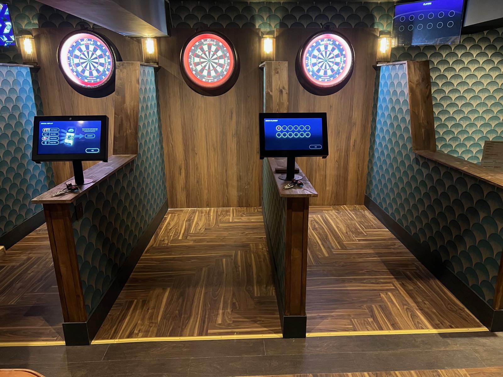 Three wood-panelled darts lanes at Annie's Room
