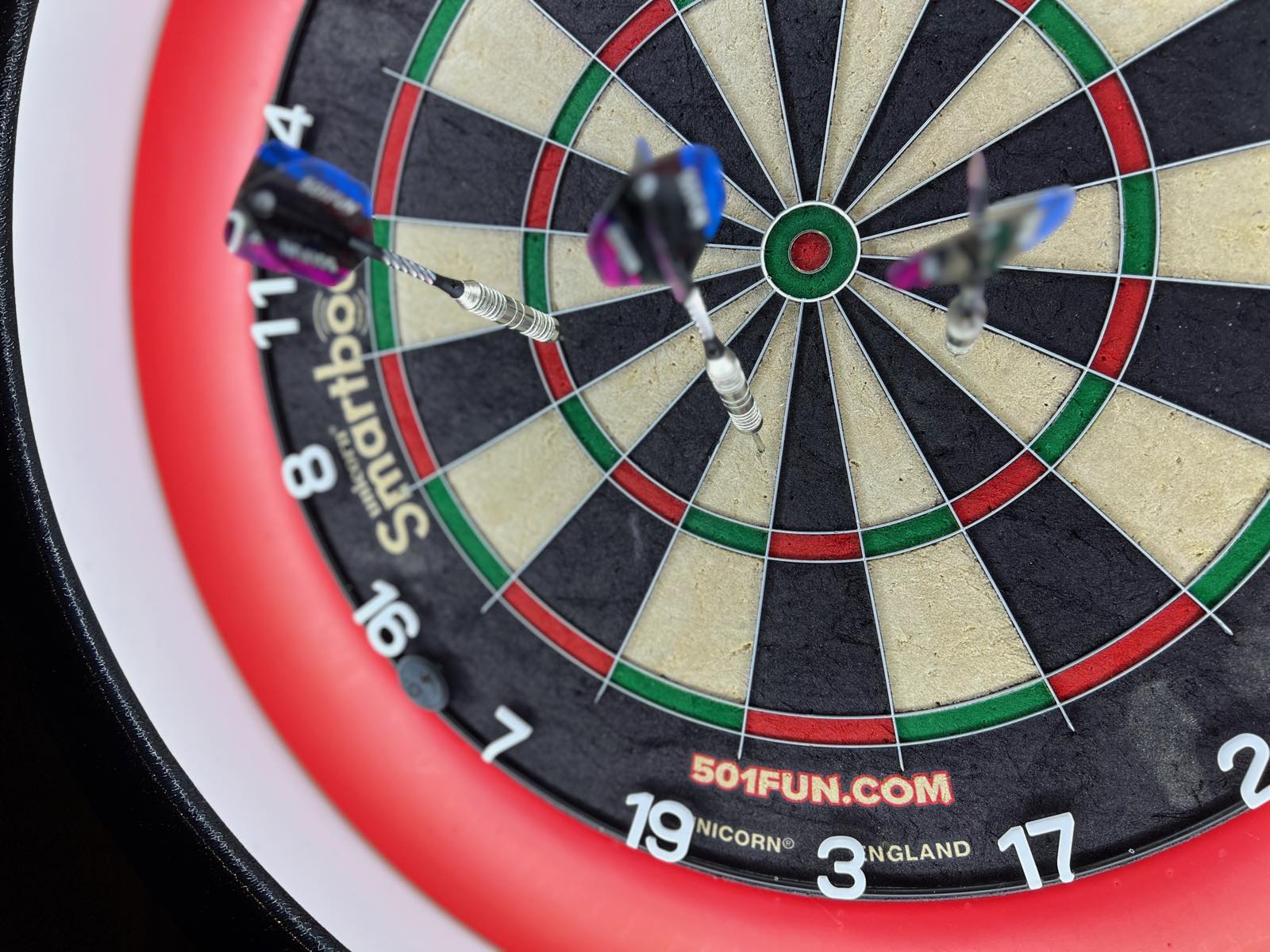 Three darts in a dartboard