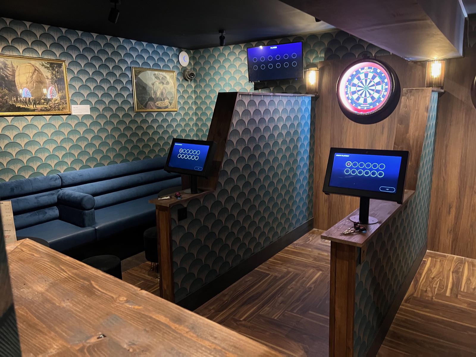 Seating and touchscreens beside the lanes