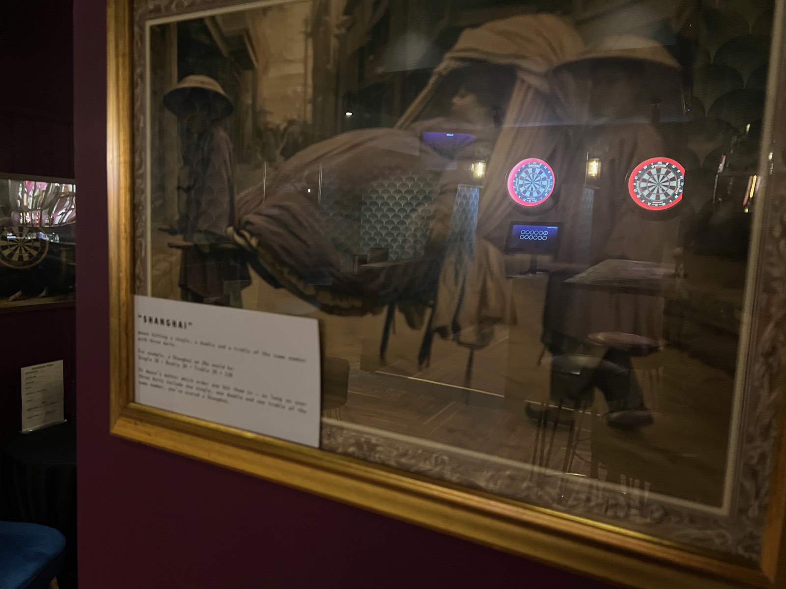 A framed painting captioned Shanghai