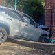 The car wedged against the brick front of the block on Clarence Lane, two days after the crash. Pic: Antony Arthur