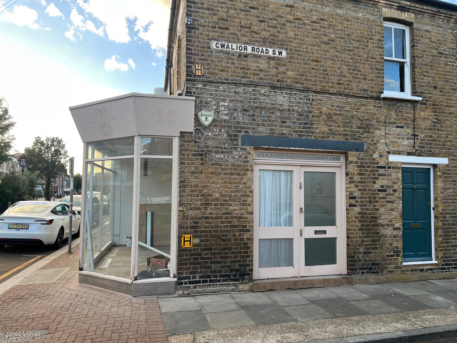 Corner of Gwalior Road with the empty Putney Baby shop and its side door